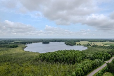Wonderful lakefront privacy on 145 AC DEER LAKE, featuring the - photo 1