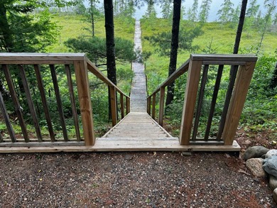 Wonderful lakefront privacy on 145 AC DEER LAKE, featuring the - photo 6