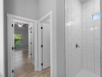 One or more photo(s) has been virtually staged. Tile throughout - photo 24