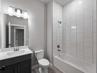 One or more photo(s) has been virtually staged. Tile throughout - photo 29