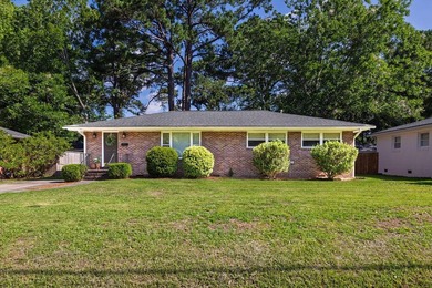 Welcome to 1056 Keats Road, a charming brick home nestled in the - photo 1