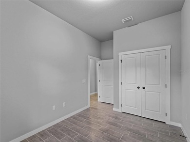 One or more photo(s) has been virtually staged. Tile throughout - photo 31
