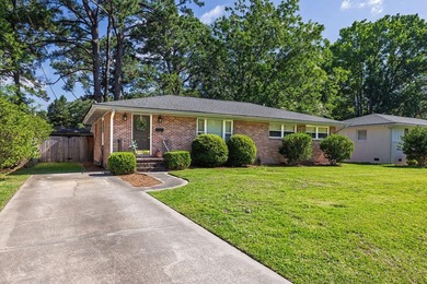 Welcome to 1056 Keats Road, a charming brick home nestled in the - photo 6