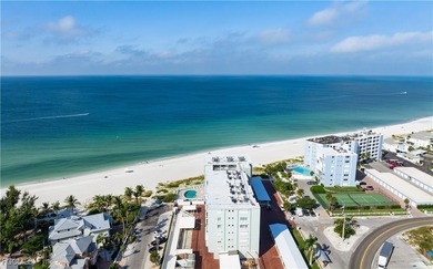 Experience true beachfront living in this stunning corner-unit - photo 10