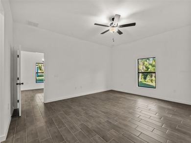 Tile throughout. Quartz countertops. Impact windows. Paver - photo 11