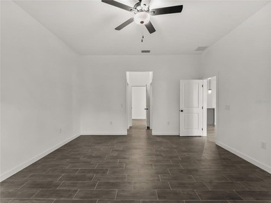 Tile throughout. Quartz countertops. Impact windows. Paver - photo 12
