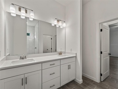 Tile throughout. Quartz countertops. Impact windows. Paver - photo 15