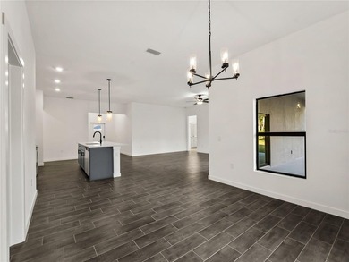 Tile throughout. Quartz countertops. Impact windows. Paver - photo 17