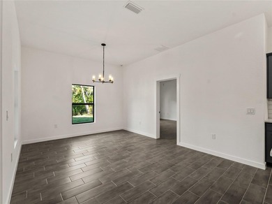 Tile throughout. Quartz countertops. Impact windows. Paver - photo 18