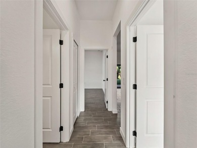 Tile throughout. Quartz countertops. Impact windows. Paver - photo 20