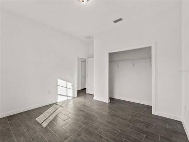 Tile throughout. Quartz countertops. Impact windows. Paver - photo 24