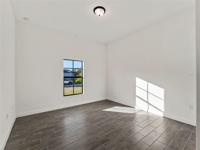 Tile throughout. Quartz countertops. Impact windows. Paver - photo 25