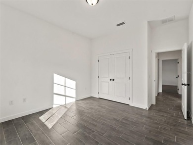 Tile throughout. Quartz countertops. Impact windows. Paver - photo 26