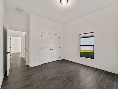 Tile throughout. Quartz countertops. Impact windows. Paver - photo 28