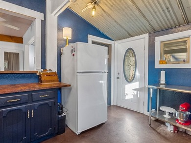Step back in time with this thoughtfully renovated turn of the - photo 8