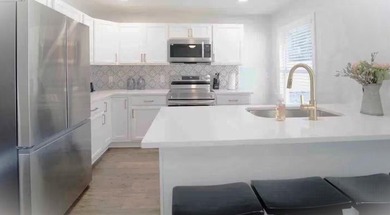 Motivated Seller! Exceptional redesigned and recently rebuilt - photo 9