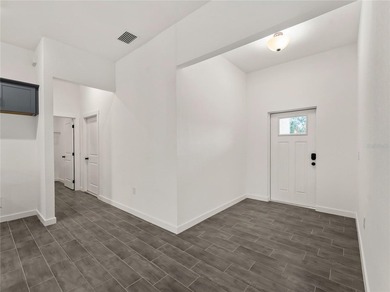 Tile throughout. Quartz countertops. Impact windows. Paver - photo 29