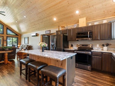 LAKE BELLE TAINE! Rare offering alert on one of the region's - photo 22