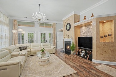 Welcome to refined, single-level luxury in the highly desirable - photo 7