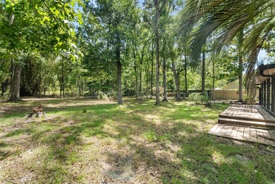 Welcome to your new home! Nestled on a spacious half-acre lot in - photo 27