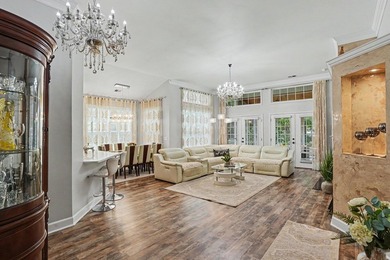 Welcome to refined, single-level luxury in the highly desirable - photo 8