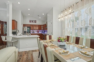 Welcome to refined, single-level luxury in the highly desirable - photo 9