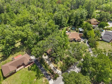 Welcome to your new home! Nestled on a spacious half-acre lot in - photo 31