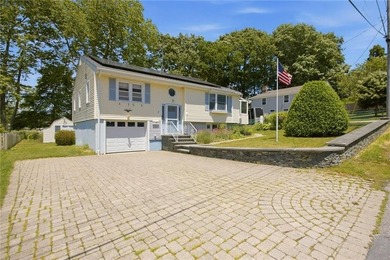 Tucked away on a quiet street and backing directly onto the open - photo 1