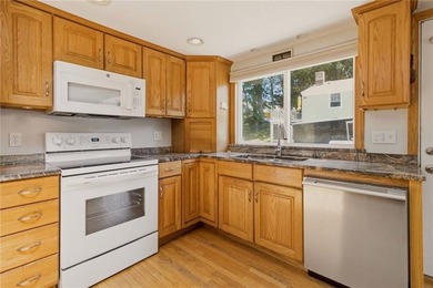 Tucked away on a quiet street and backing directly onto the open - photo 9