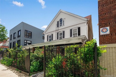 Welcome to 2281 Loring Place North, a spacious two-family home - photo 2