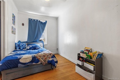 Welcome to 2281 Loring Place North, a spacious two-family home - photo 8