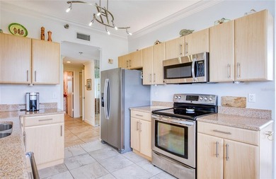 This spacious corner unit in Harbourside is move-in ready with - photo 7