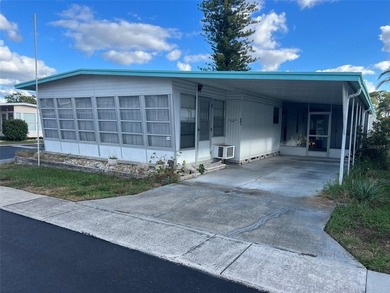 REDUCED PRICE! Situated on a generous corner lot in this 55+ - photo 1