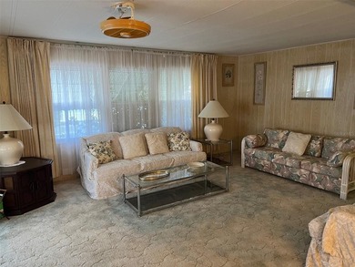 REDUCED PRICE! Situated on a generous corner lot in this 55+ - photo 9