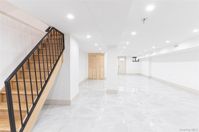 This lovely 2-family home was gut renovated in 2020 and includes - photo 13