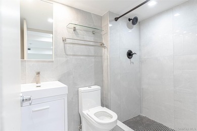 This lovely 2-family home was gut renovated in 2020 and includes - photo 15