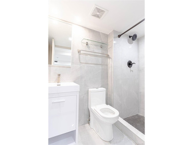 This lovely 2-family home was gut renovated in 2020 and includes - photo 16