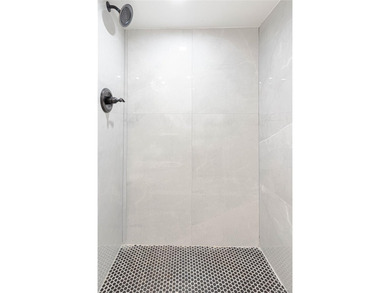 This lovely 2-family home was gut renovated in 2020 and includes - photo 17