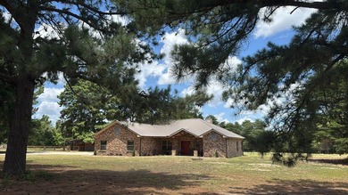Nestled on 3+ acres just minutes from Lake Athens, this - photo 1