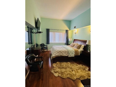 Wake up to sparkling water views from this bright and spacious - photo 18