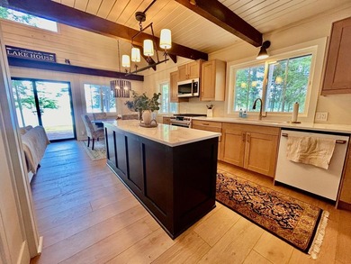STUNNING FOUR MILE LAKE CHALET! Experience the best of - photo 10