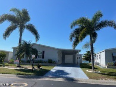 Lake Home For Sale in North Fort Myers, Florida