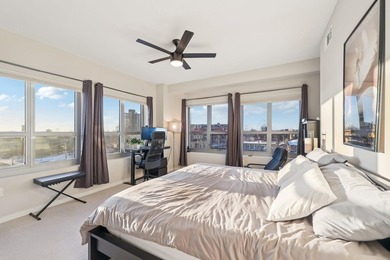 This Skyscape single-level end-unit condo offers the privacy and - photo 15