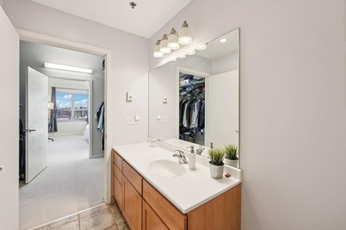 This Skyscape single-level end-unit condo offers the privacy and - photo 22