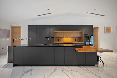 Step into this meticulously renovated residence in the Western - photo 8
