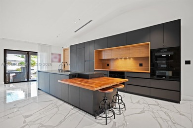 Step into this meticulously renovated residence in the Western - photo 9