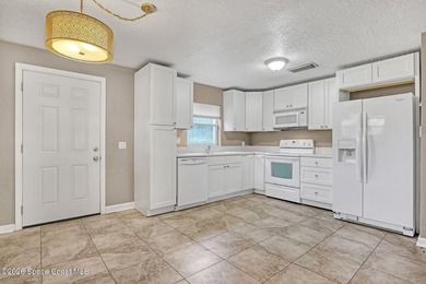 PRICED TO SELL! Cottage charm meets coastal opportunity! Tucked - photo 13