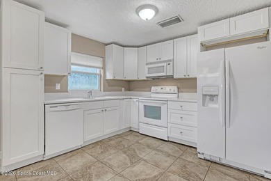 PRICED TO SELL! Cottage charm meets coastal opportunity! Tucked - photo 14