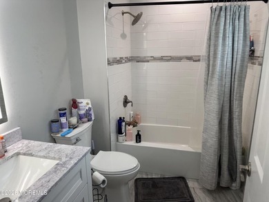 Totally renovated 2023. Open kitchen/living room floor plan with - photo 15