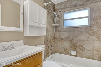 PRICED TO SELL! Cottage charm meets coastal opportunity! Tucked - photo 17